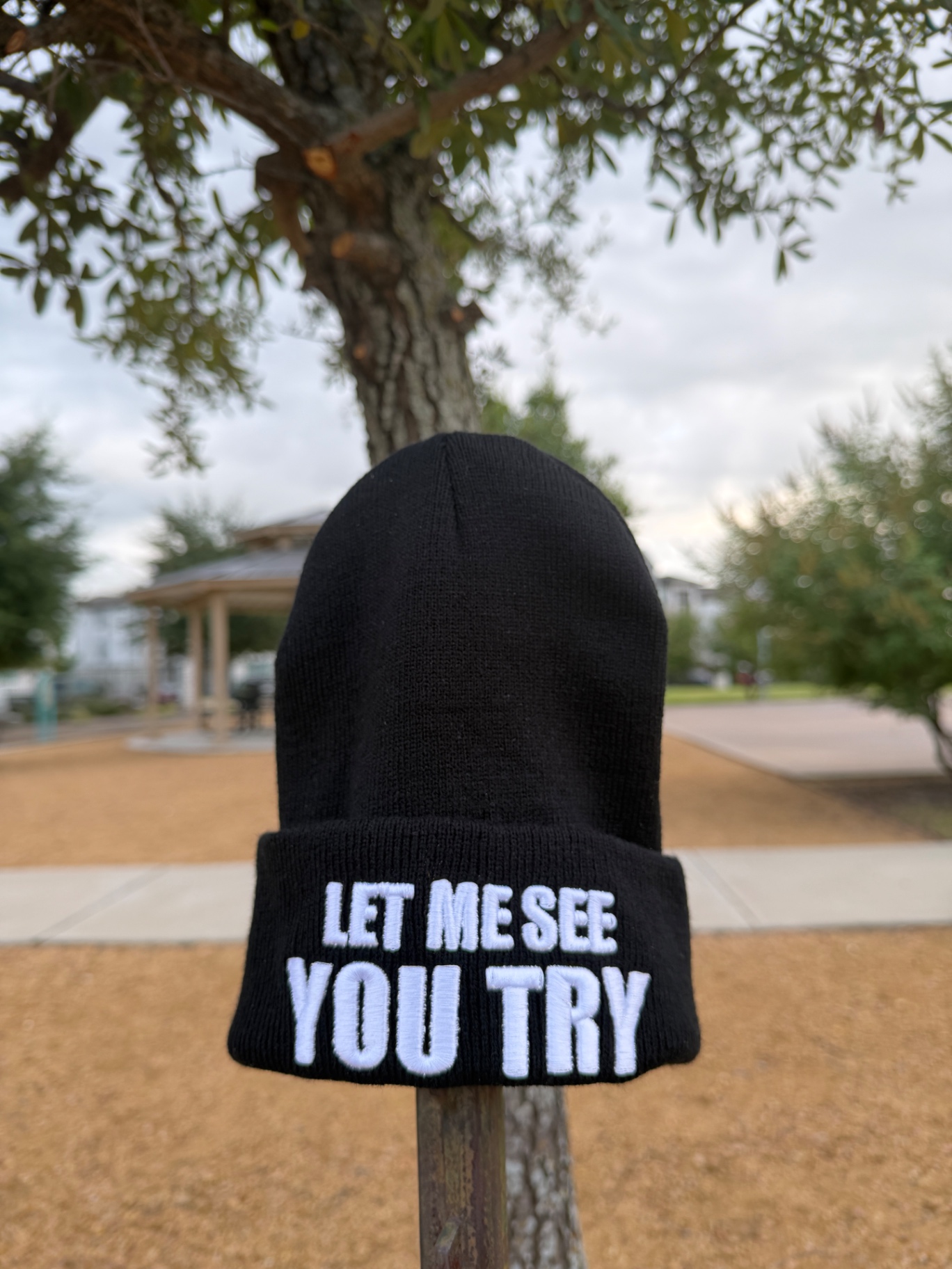 Origin beanie photographed outdoors